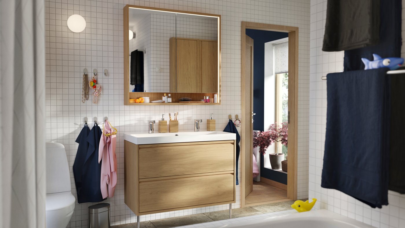A chrome-plated BROGRUND wash-basin mixer tap with sensor