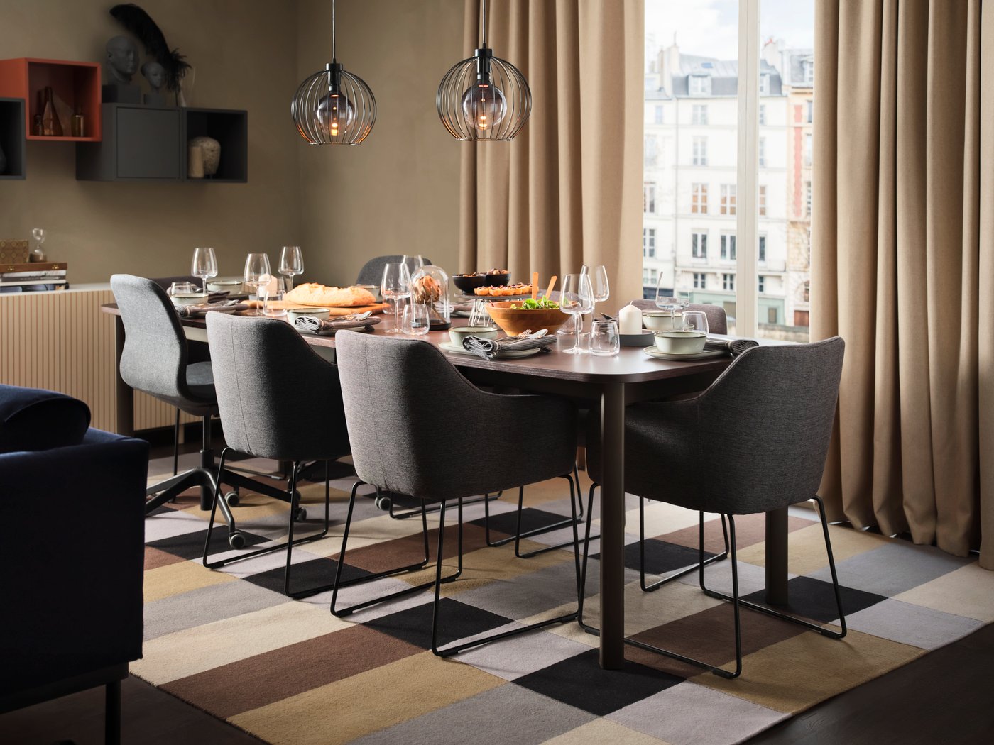 A handmade/chequered brown STOCKHOLM rug, flatwoven in the dining room