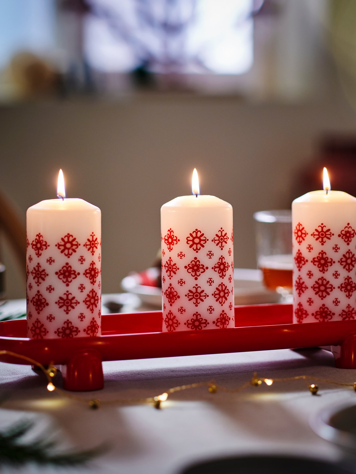 Three festive candles