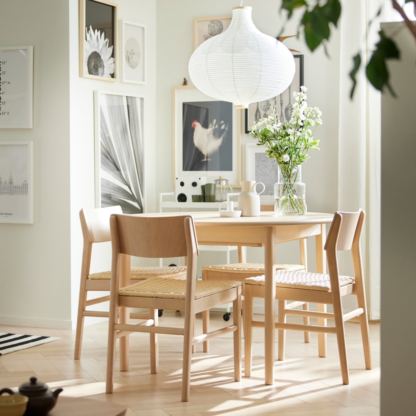 A light beech/veneer SKANSNÄS extendable table