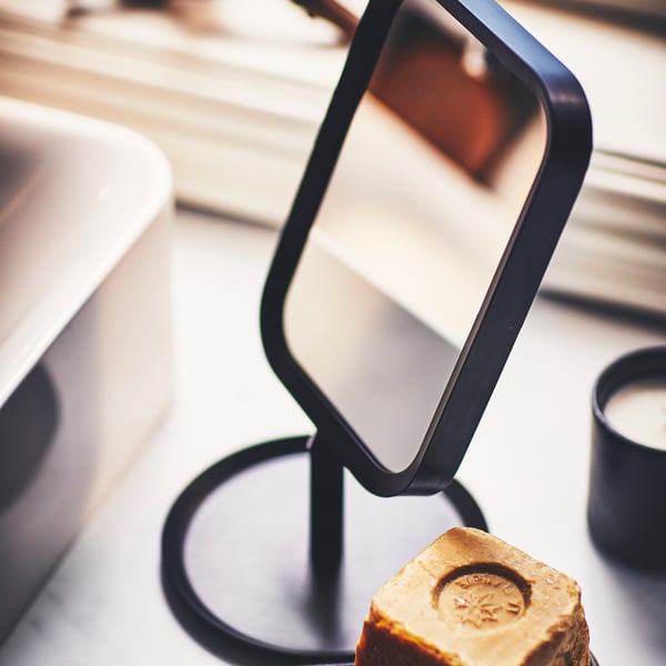 A black LINDBYN table mirror
