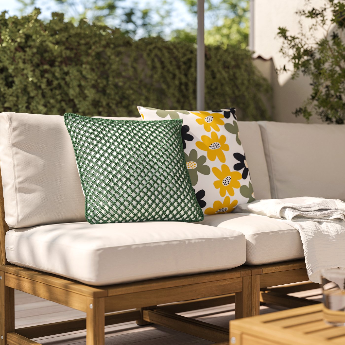 A dark grey-green outdoor/indoor TOFTÖ cushion cover
