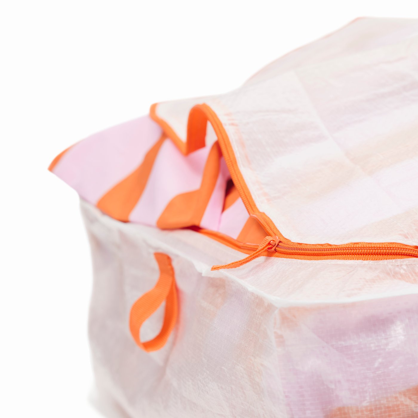 An orange/pink/striped SLÅNHÖSTMAL duvet cover and pillowcase