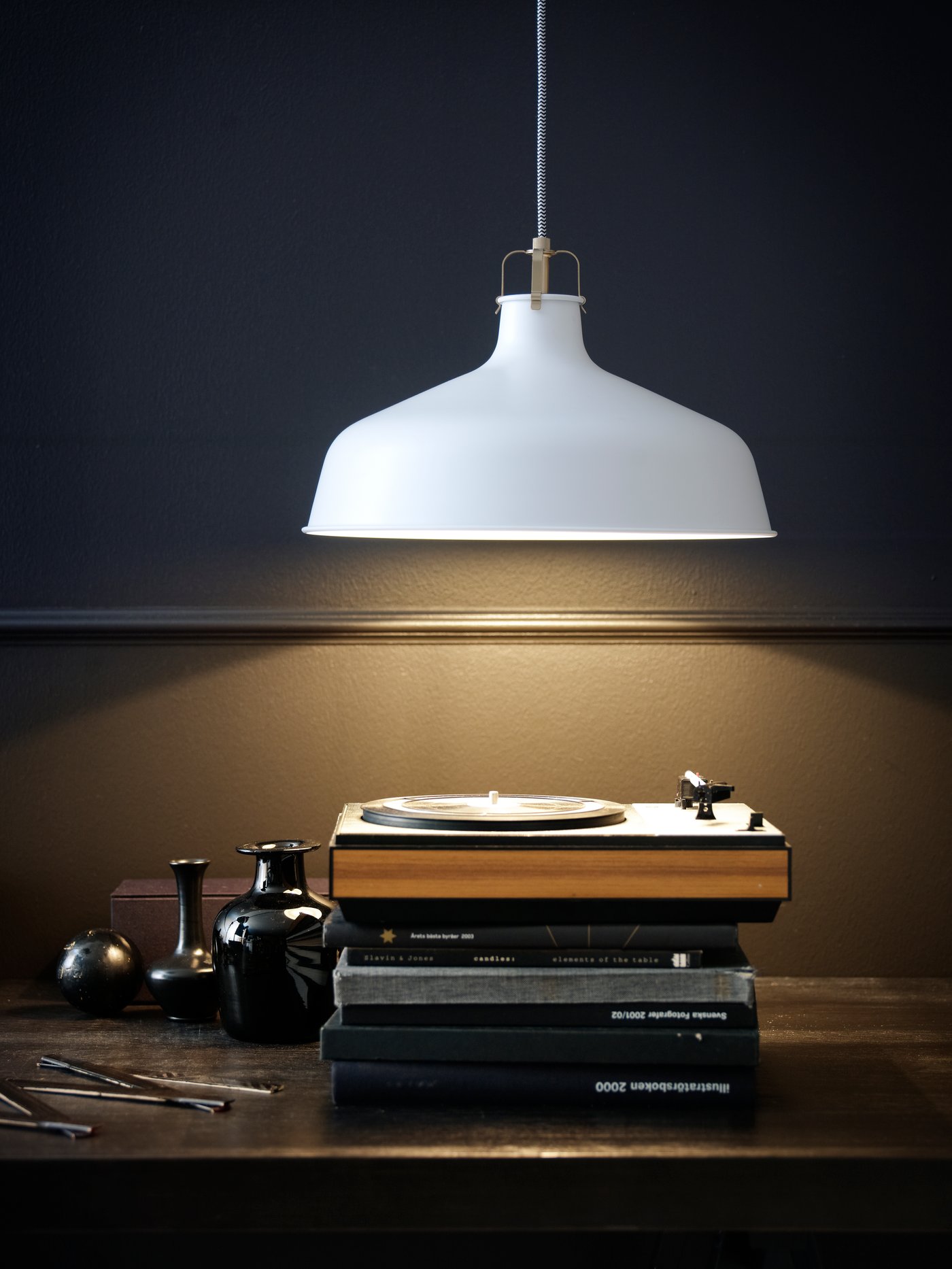 A white RANARP pendant lamp.