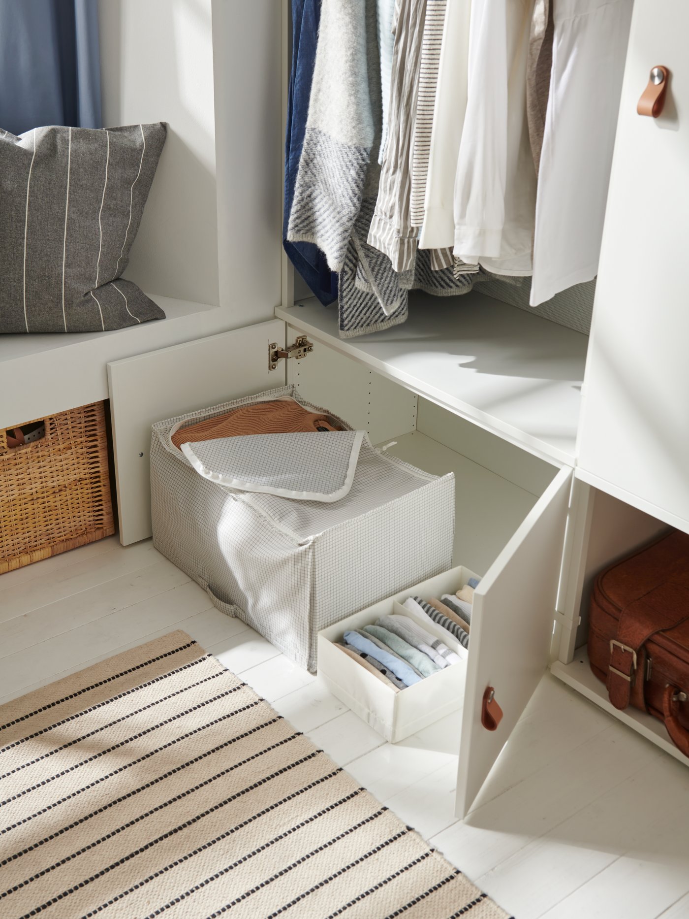 IKEA STUK clothes storage boxes in the bedroom.
