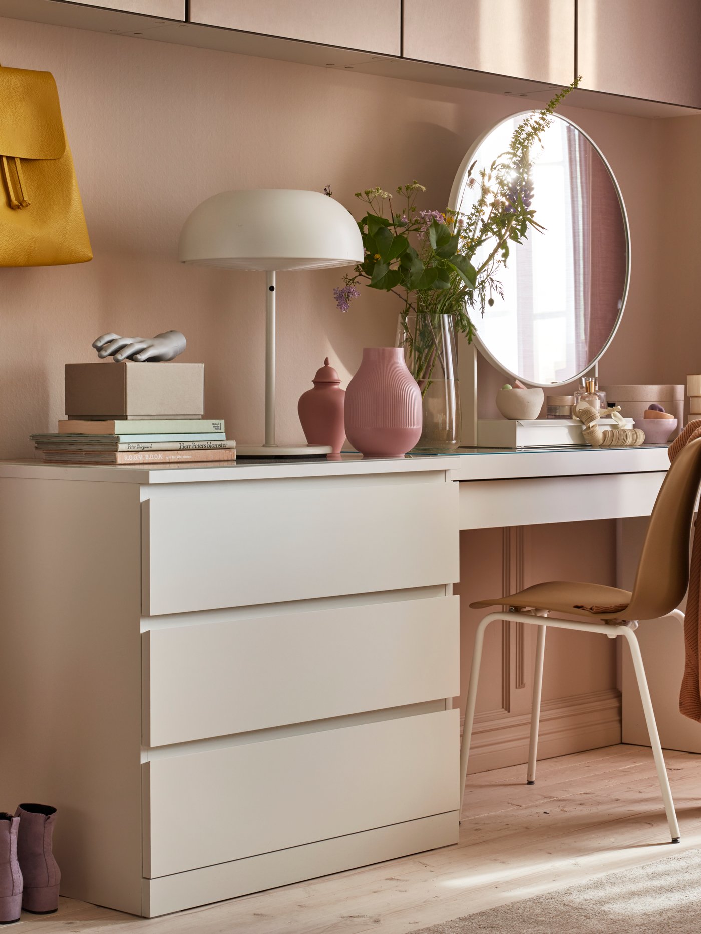 A white MALM chest of 3 drawers in the bedroom