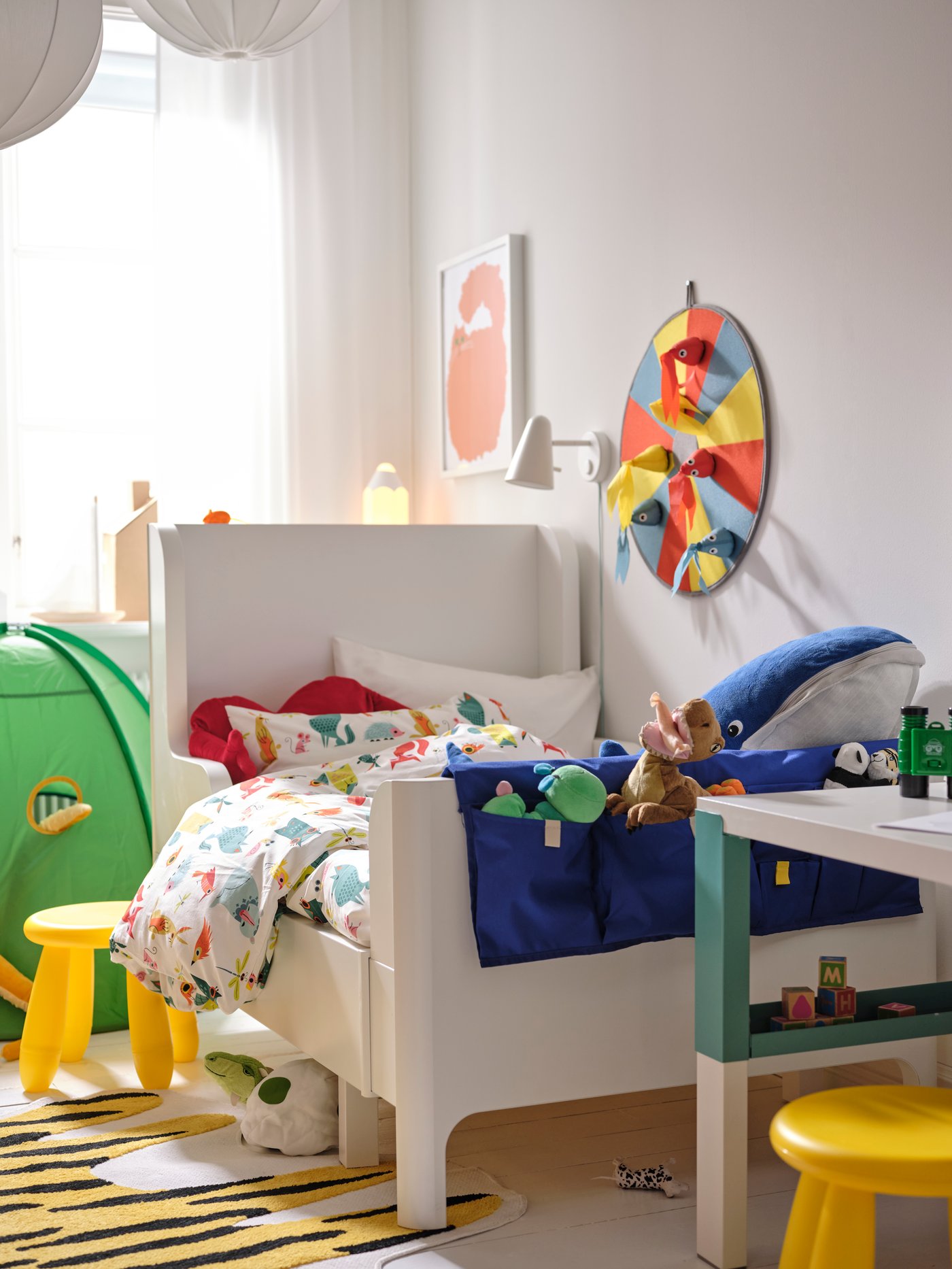 A small children's room with a BUSUNGE children's bed.