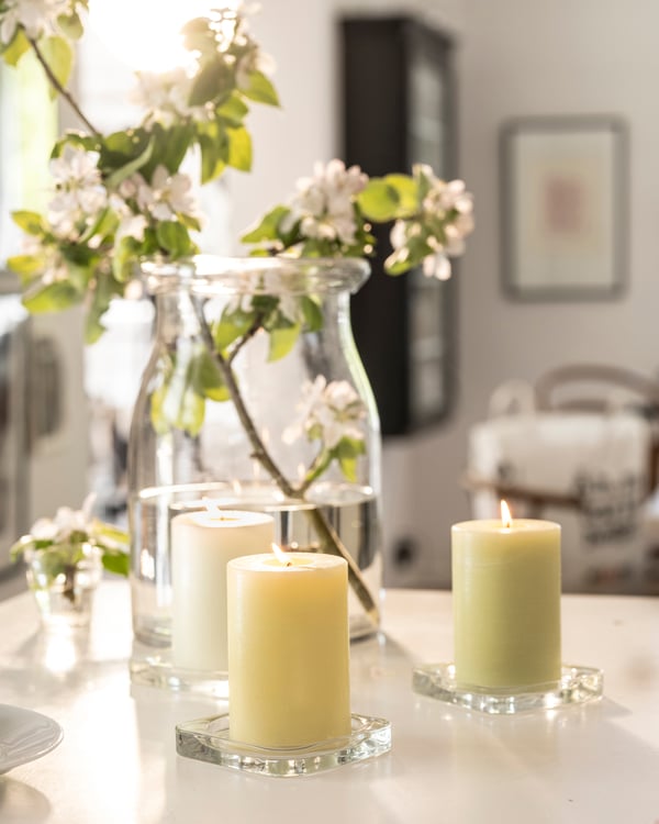 An Apple mixed colours LÖVSKOGSLUND scented pillar candle