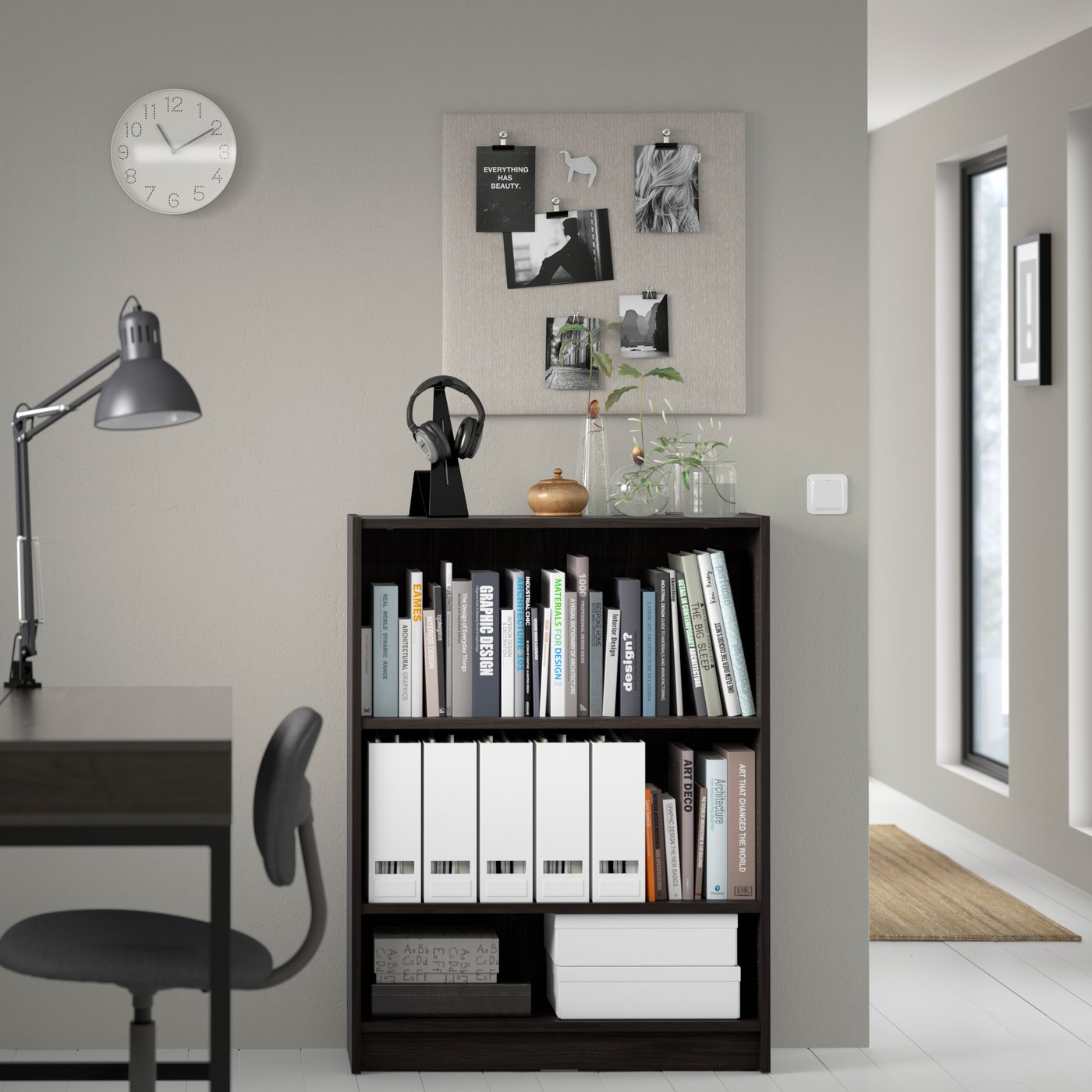 A dark brown oak effect BILLY bookcase