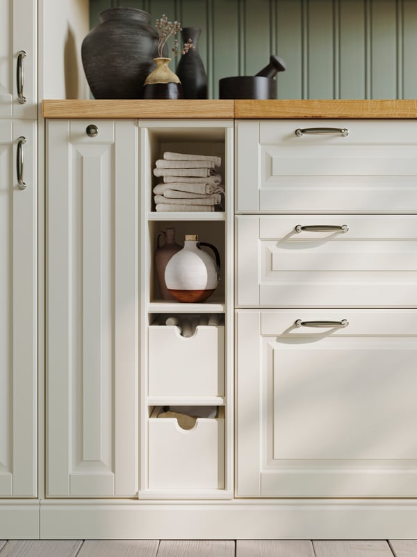 An off-white BODBYN drawer front