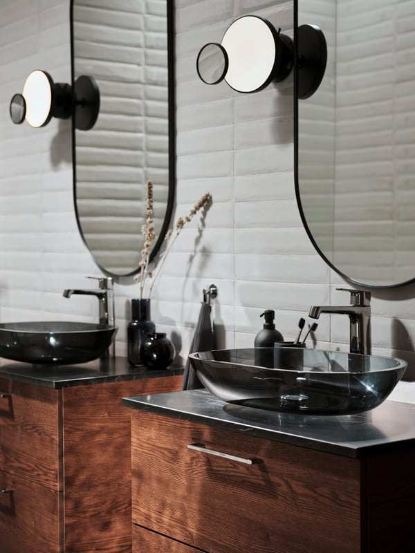 A glass/dark grey OXMYREN countertop wash-basin