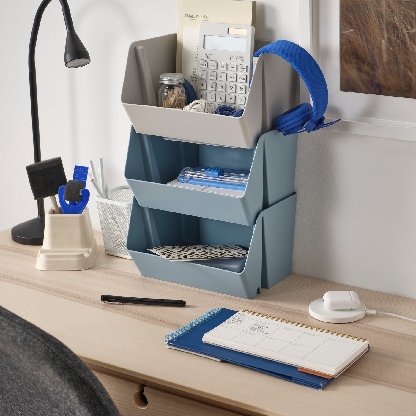 A white LIVBOJ wireless charger in the home office