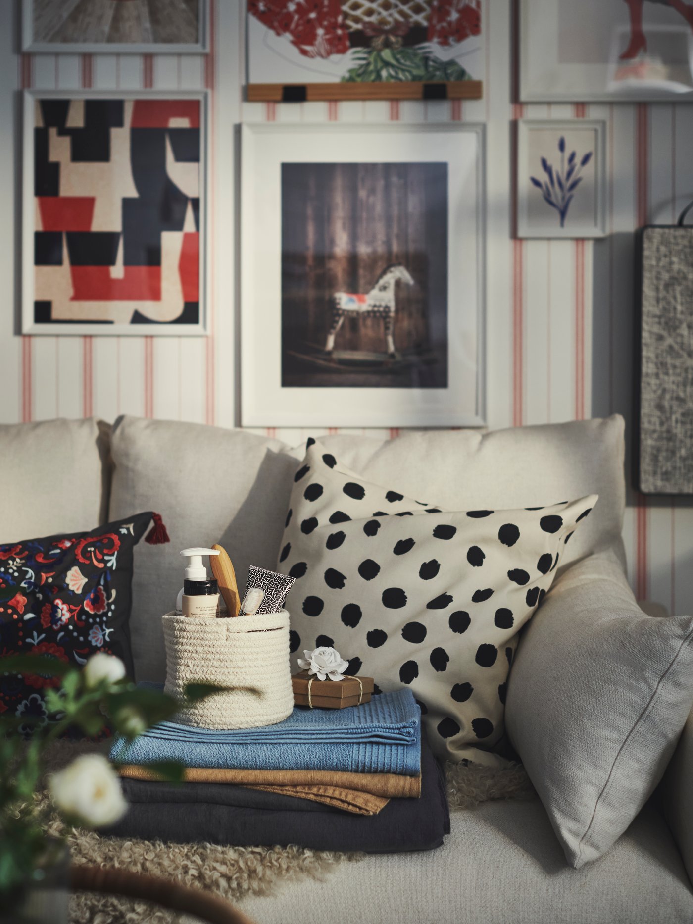 A dark grey DYTÅG duvet cover and pillowcase