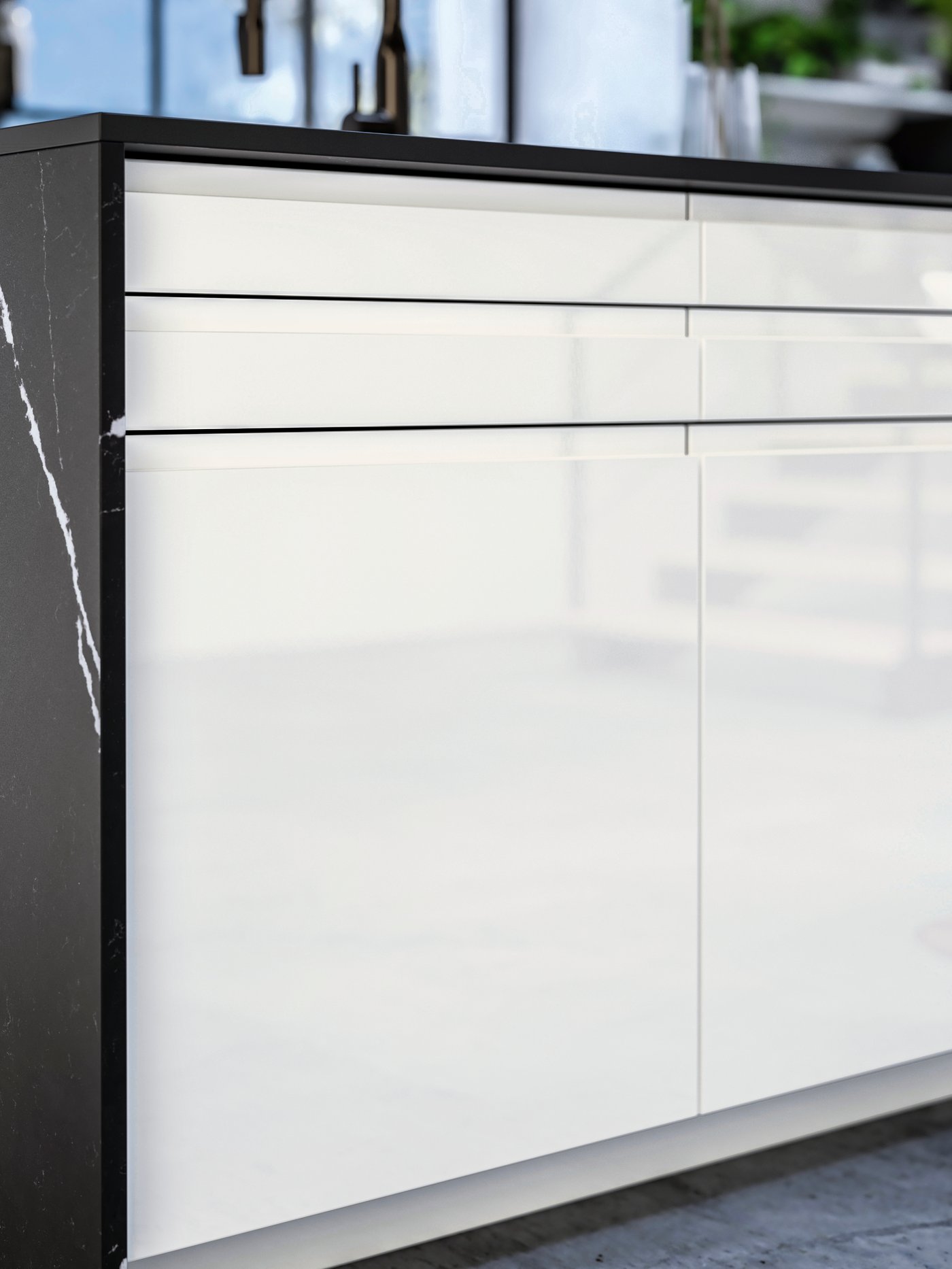 A high-gloss white VOXTORP door