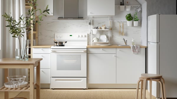 A birch BEKVÄM kitchen trolley in the kitchen