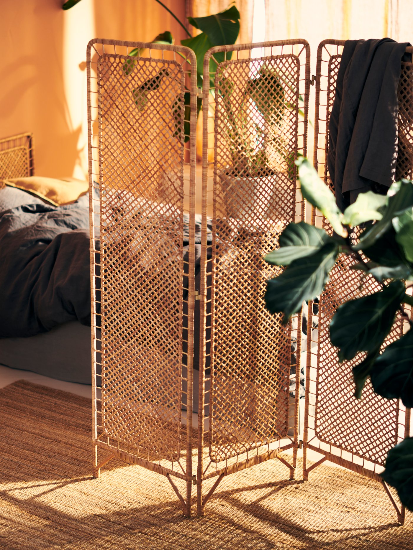A handmade rattan TOLKNING room divider