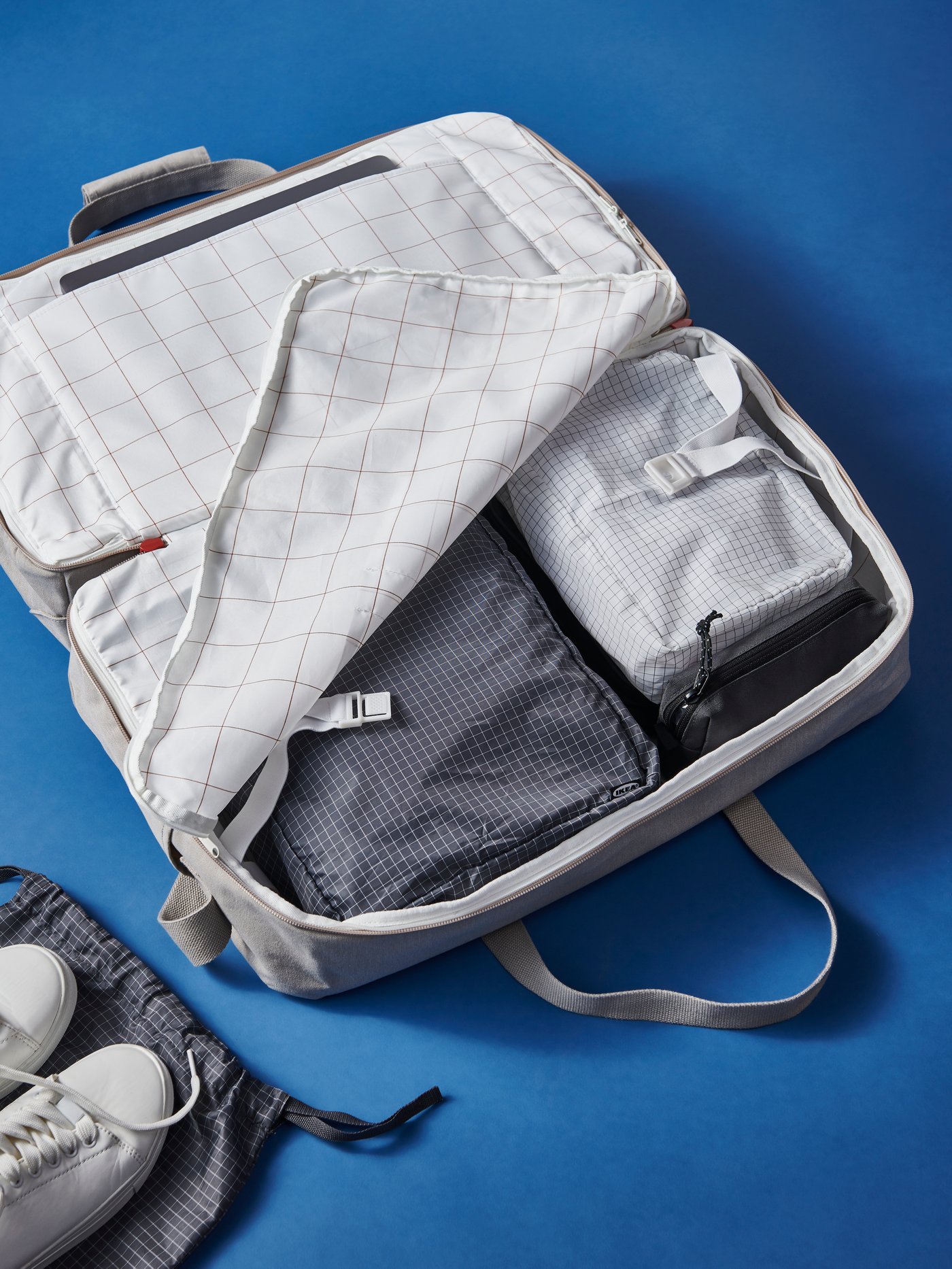 RENSARE Packwürfel in einer Tasche.