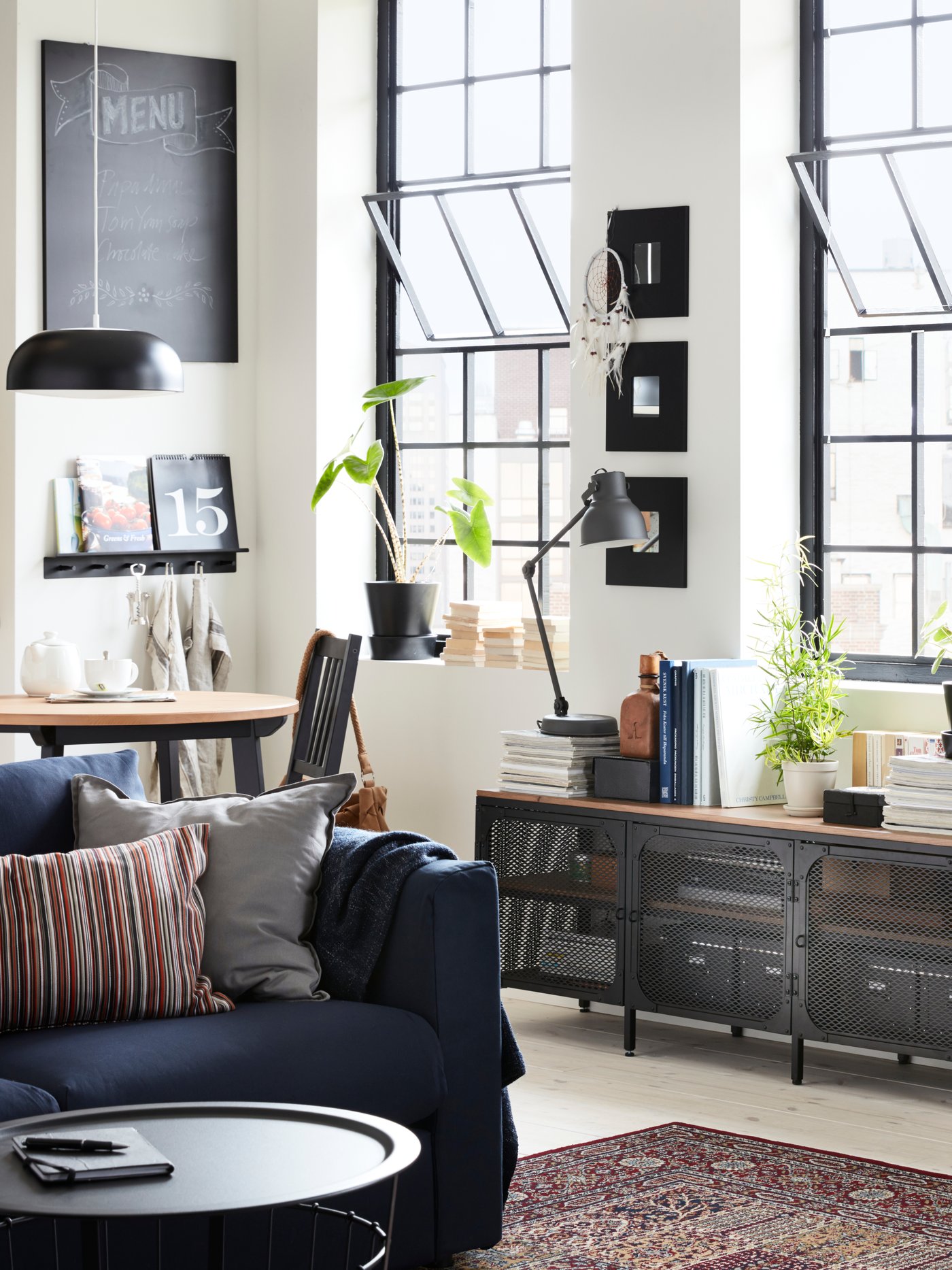 A light antique stain/black stained GAMLARED table in the living room