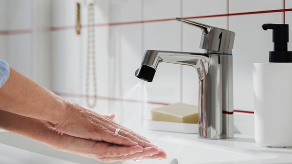 An ÅBÄCKEN mist nozzle for mixer tap in the bathroom