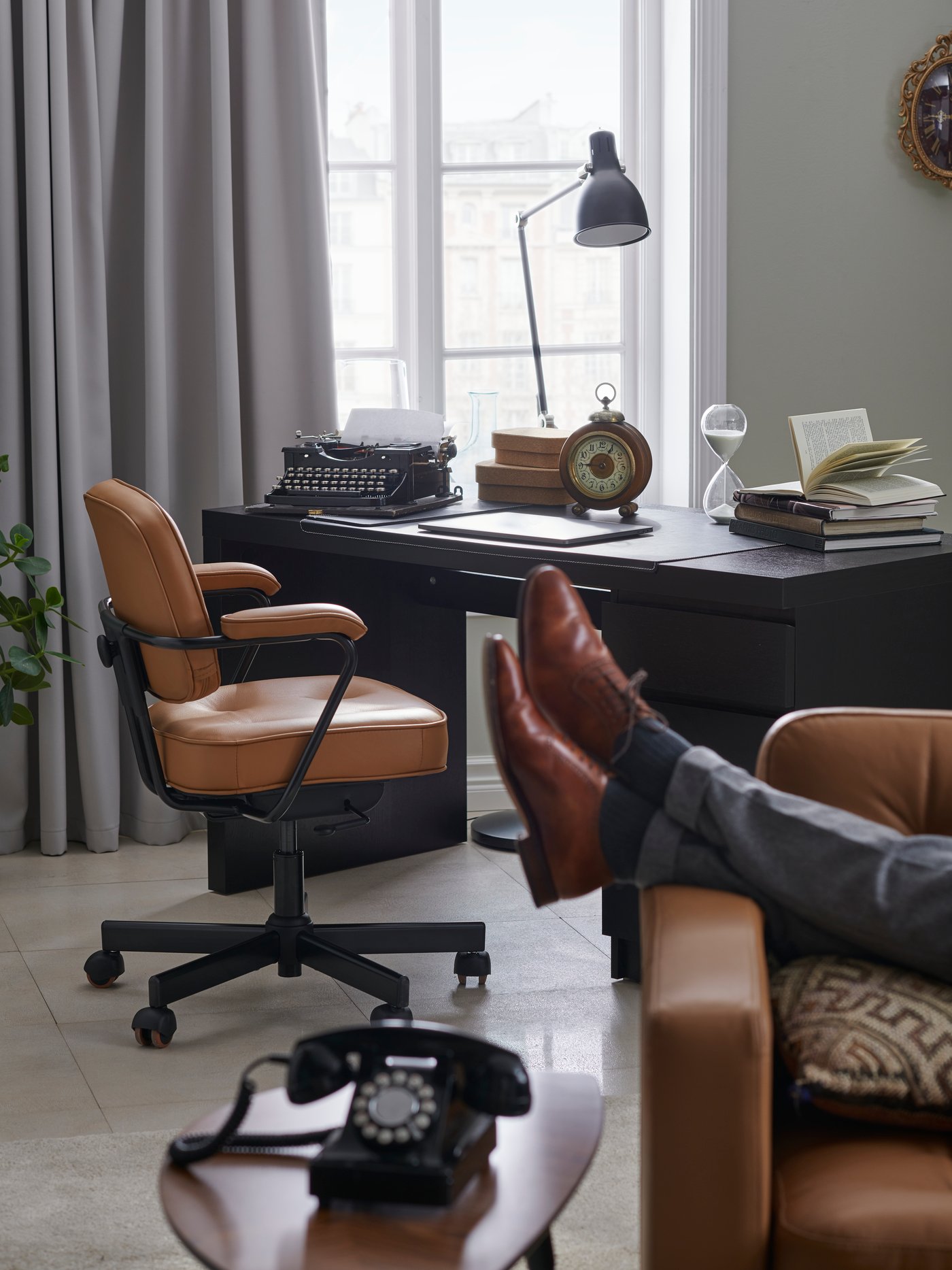 A grey HILLEBORG block-out curtains, 1 pair in the home office.