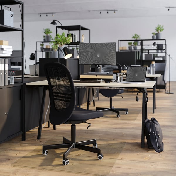 Office furniture in an office.
