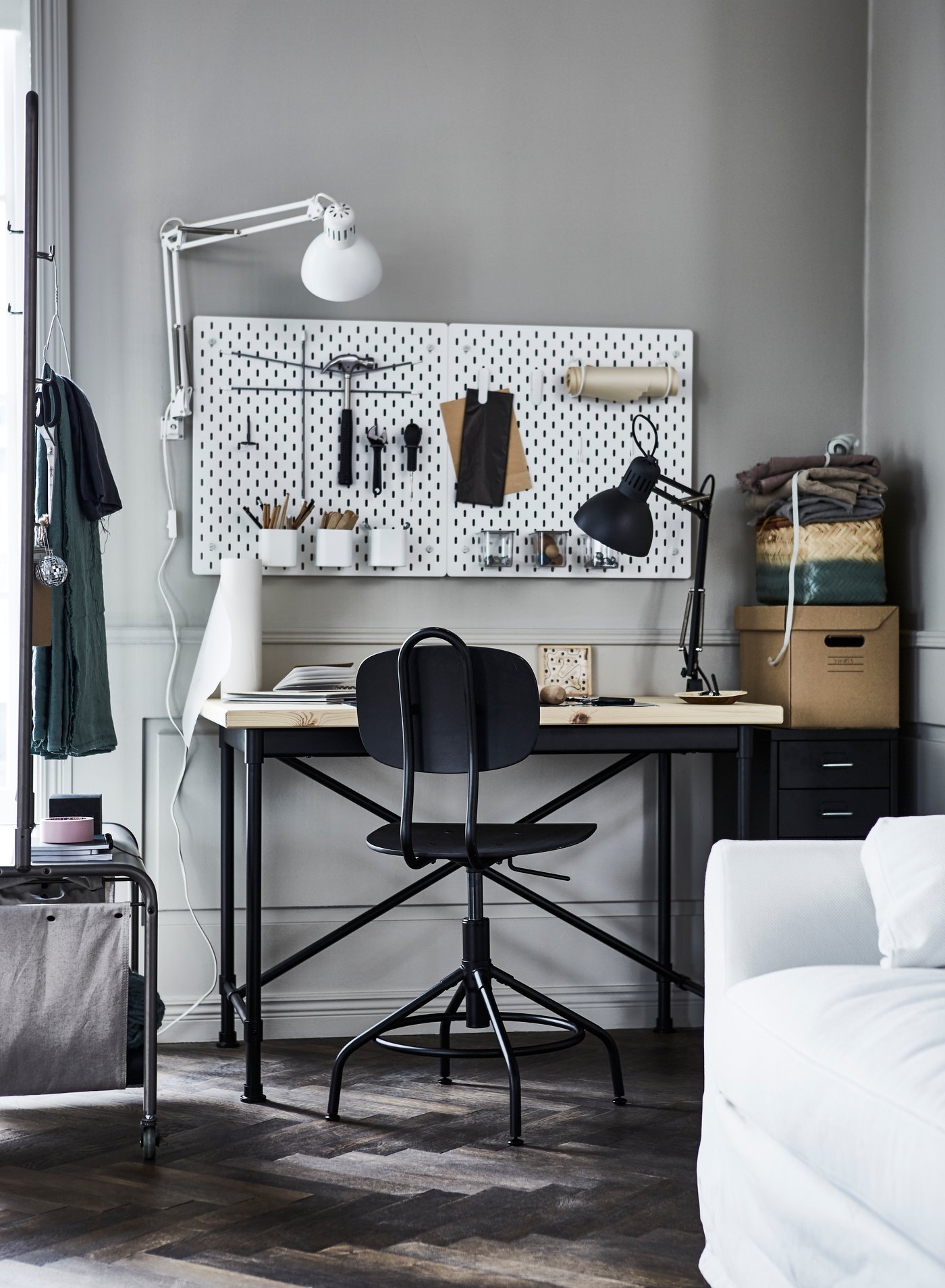 A white SKÅDIS pegboard in the home office