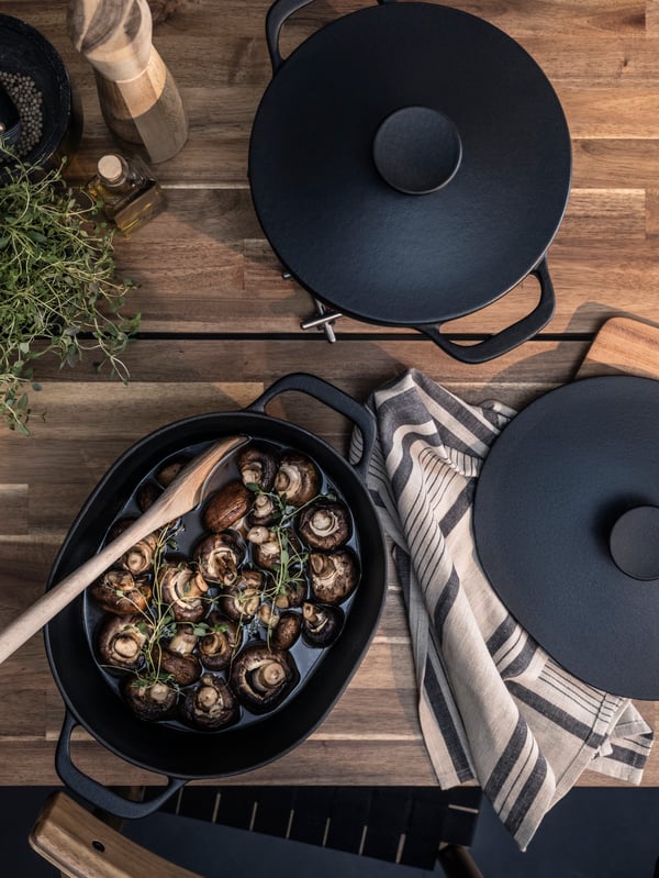 Swedish Christmas buffet table with meatballs, herring and other IKEA food in servingware including VARDAGEN casserole.