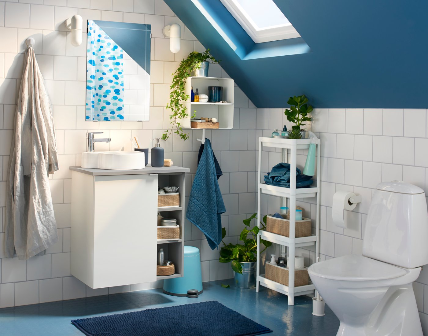 A white VESKEN shelf unit