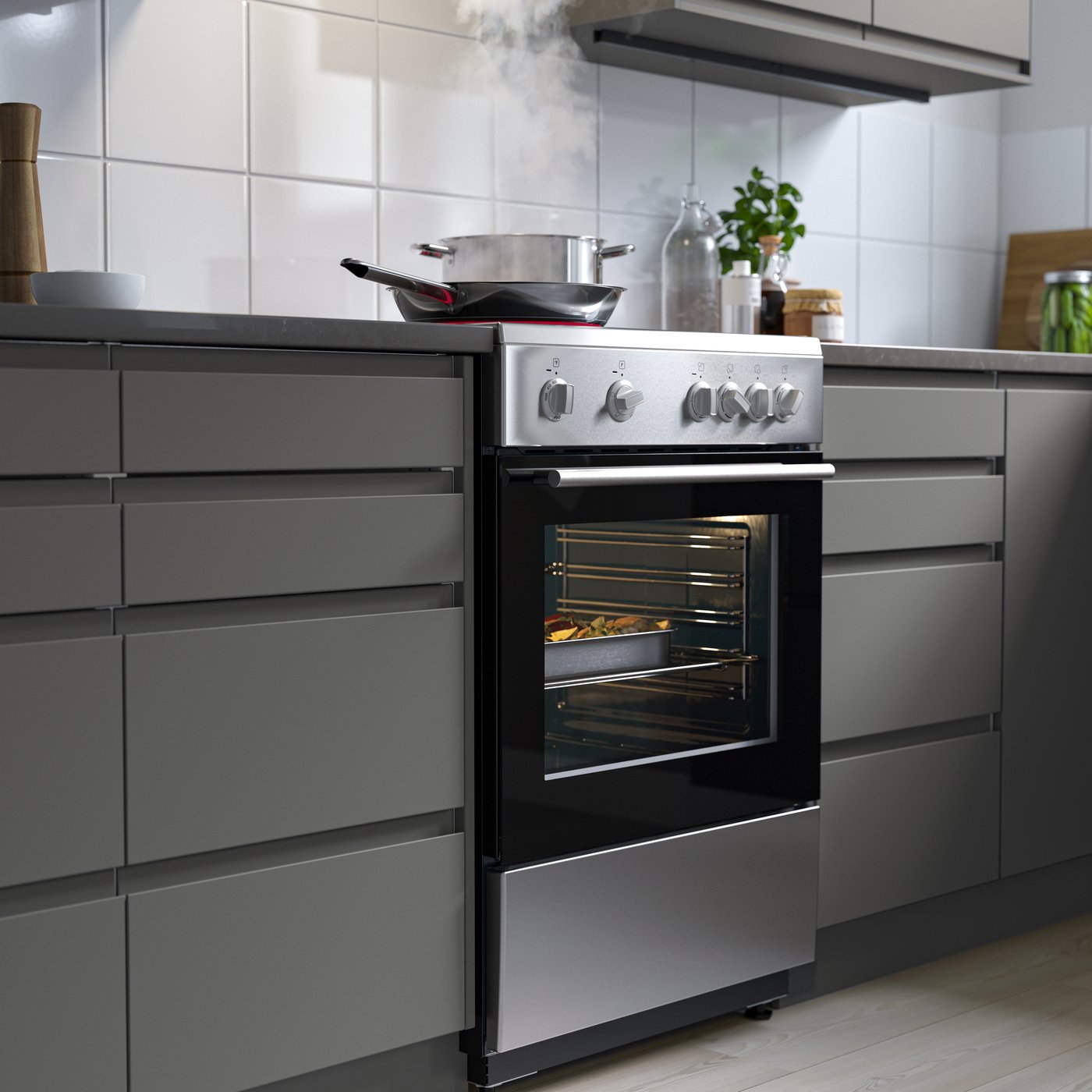 a stainless steel range with cooktop in a kitchen