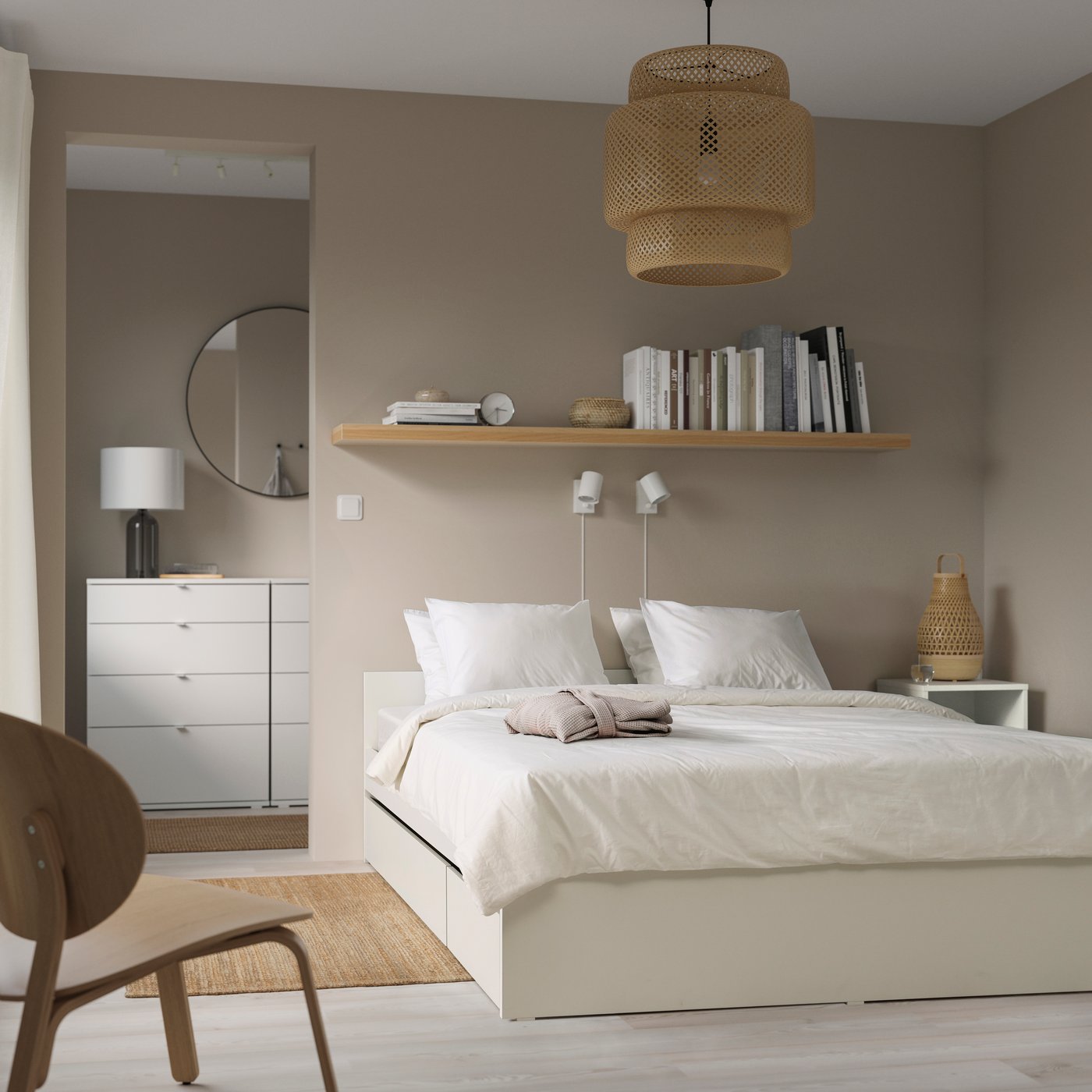A white/Luröy VIHALS bed frame with 2 storage boxes in the bedroom