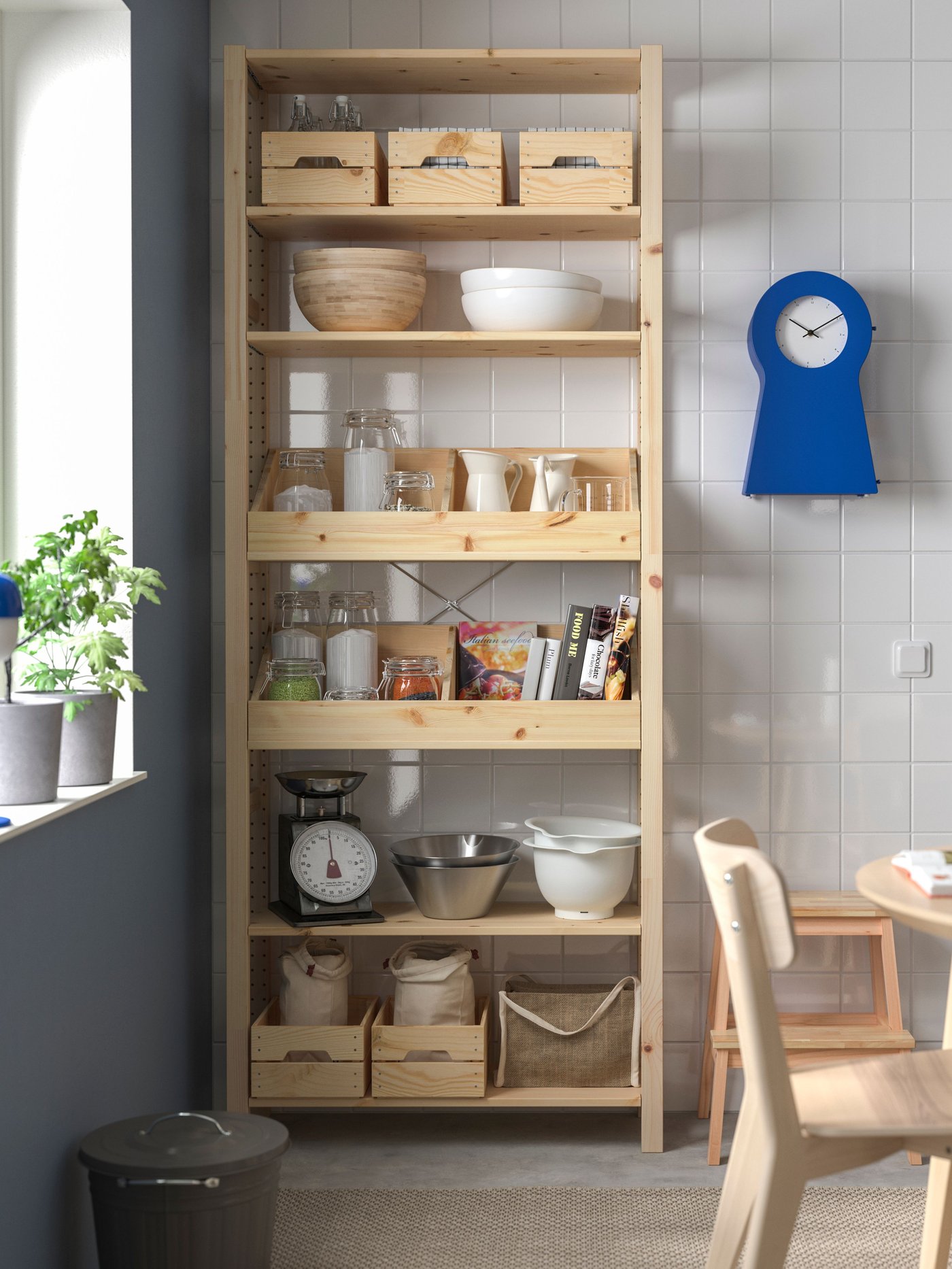 A with 2 box shelves/pine IVAR shelving unit in the dining room