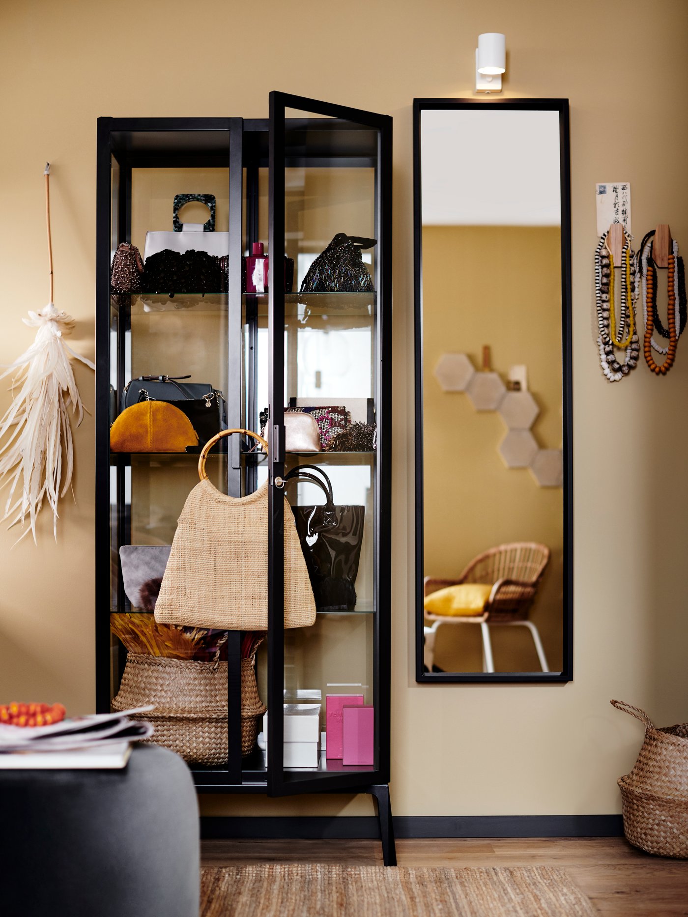 A black NISSEDAL mirror in the living room