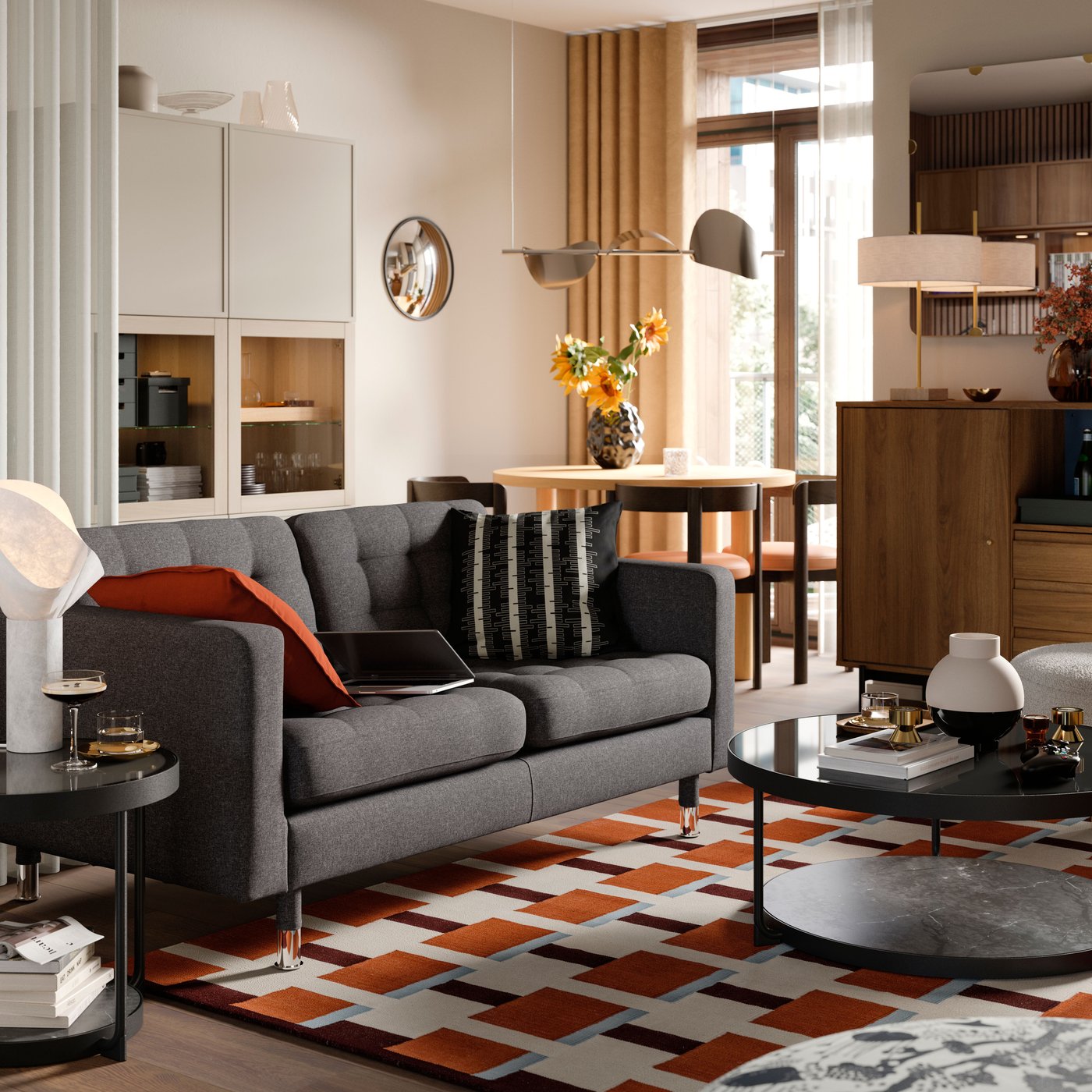 A red-brown DYTÅG cushion cover in the living room