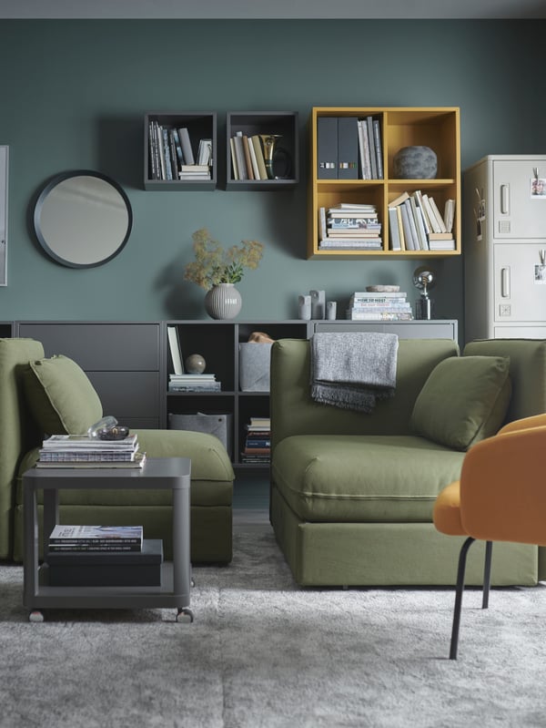 A medium grey STOENSE rug, low pile in the living room