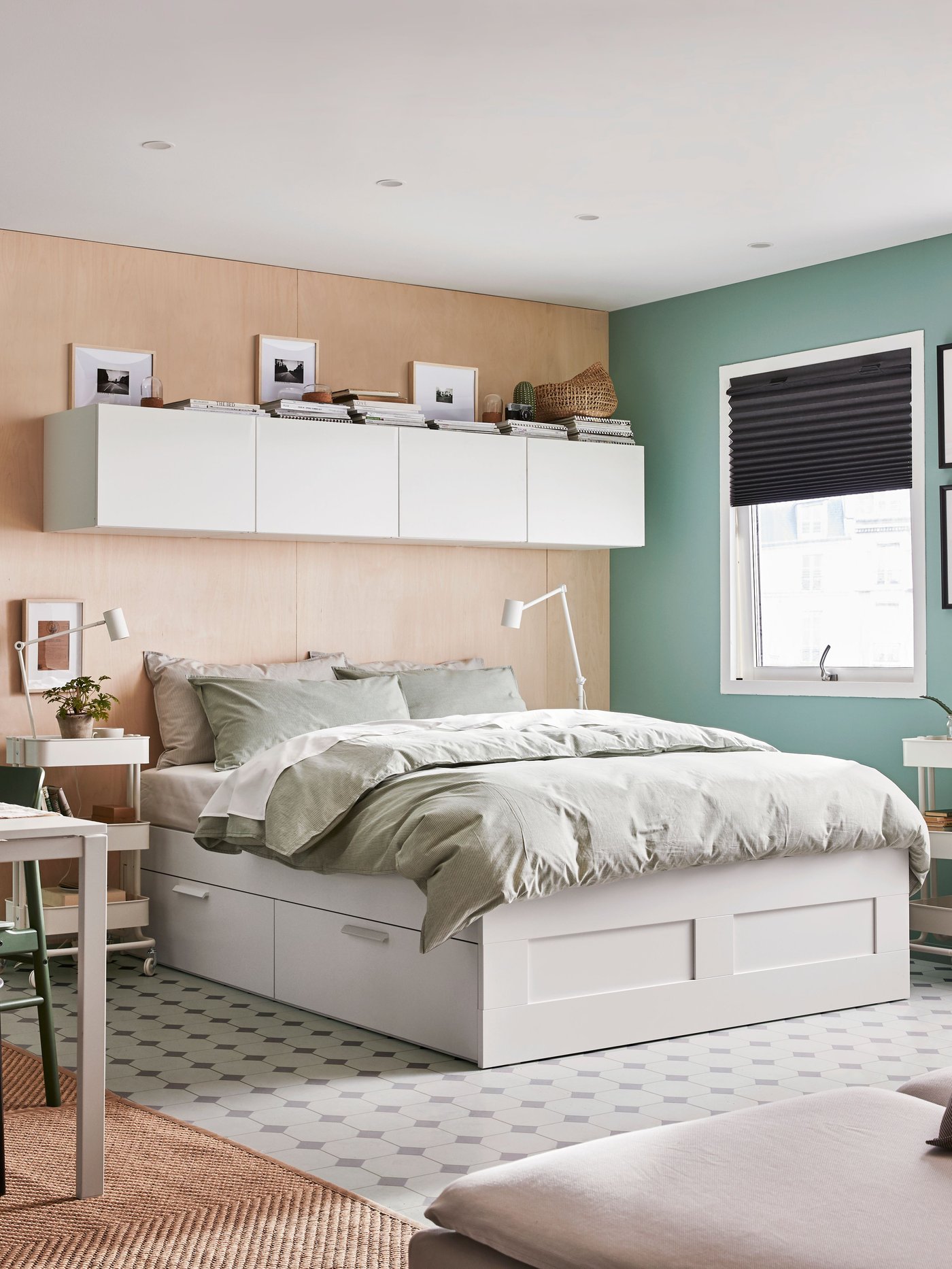 A white BRIMNES ottoman bed in the bedroom