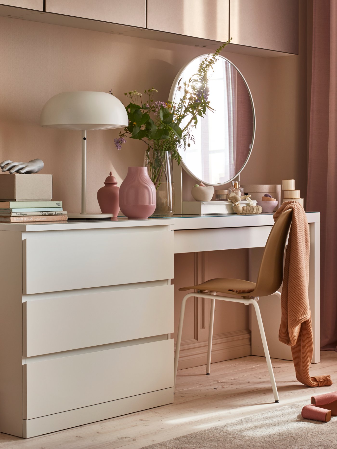 A white MALM dressing table in the bedroom