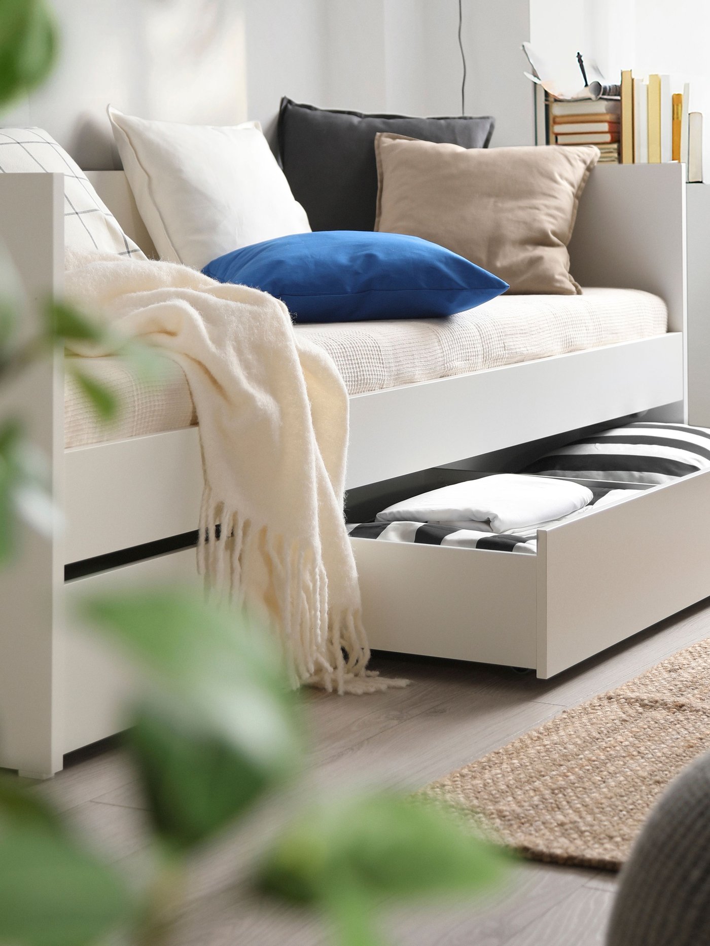 A firm/white ÅFJÄLL foam mattress
