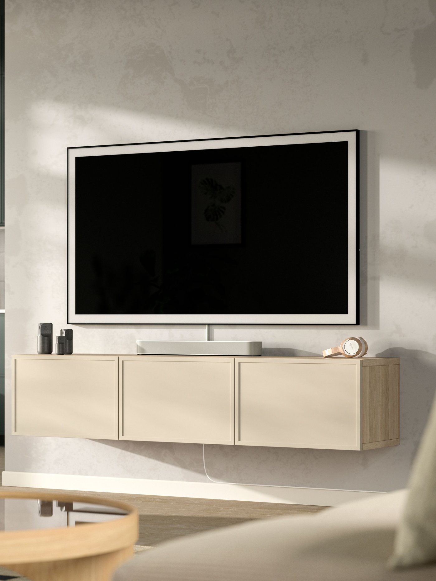 A white stained oak effect/Krukmakare beige BESTÅ TV bench with doors in the living room