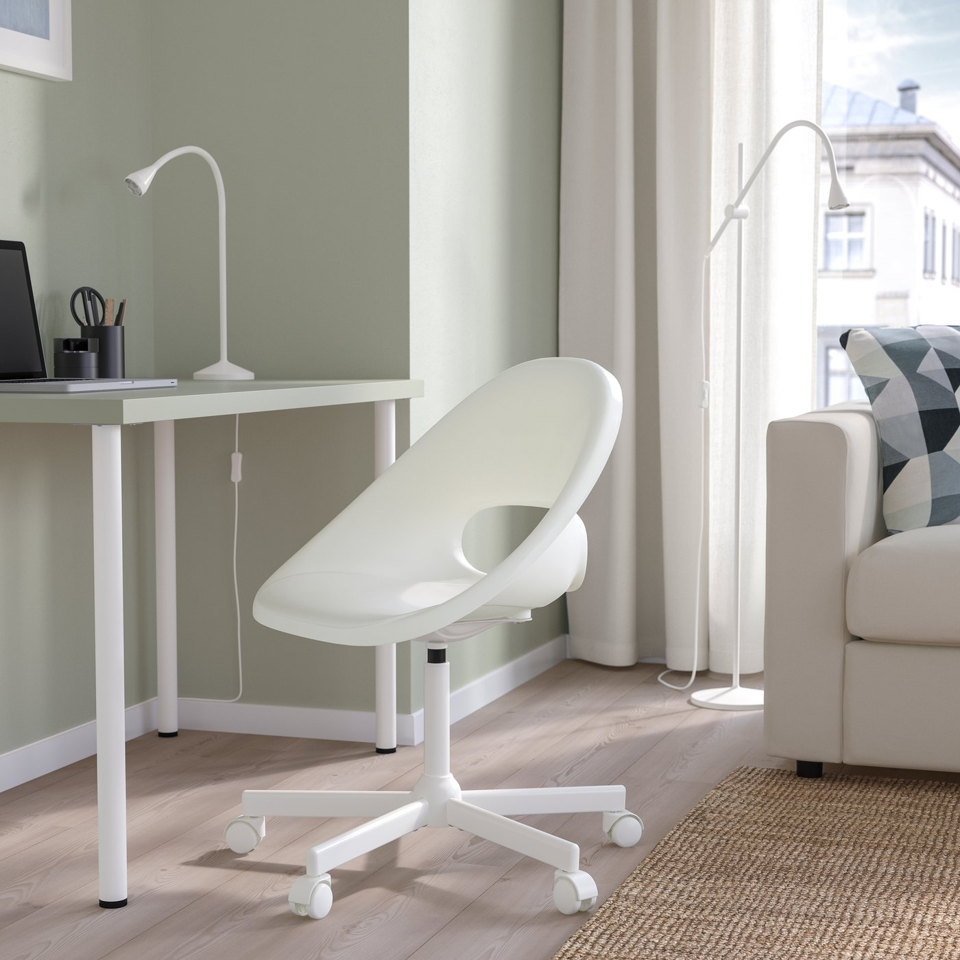 A white MALSKÄR swivel chair