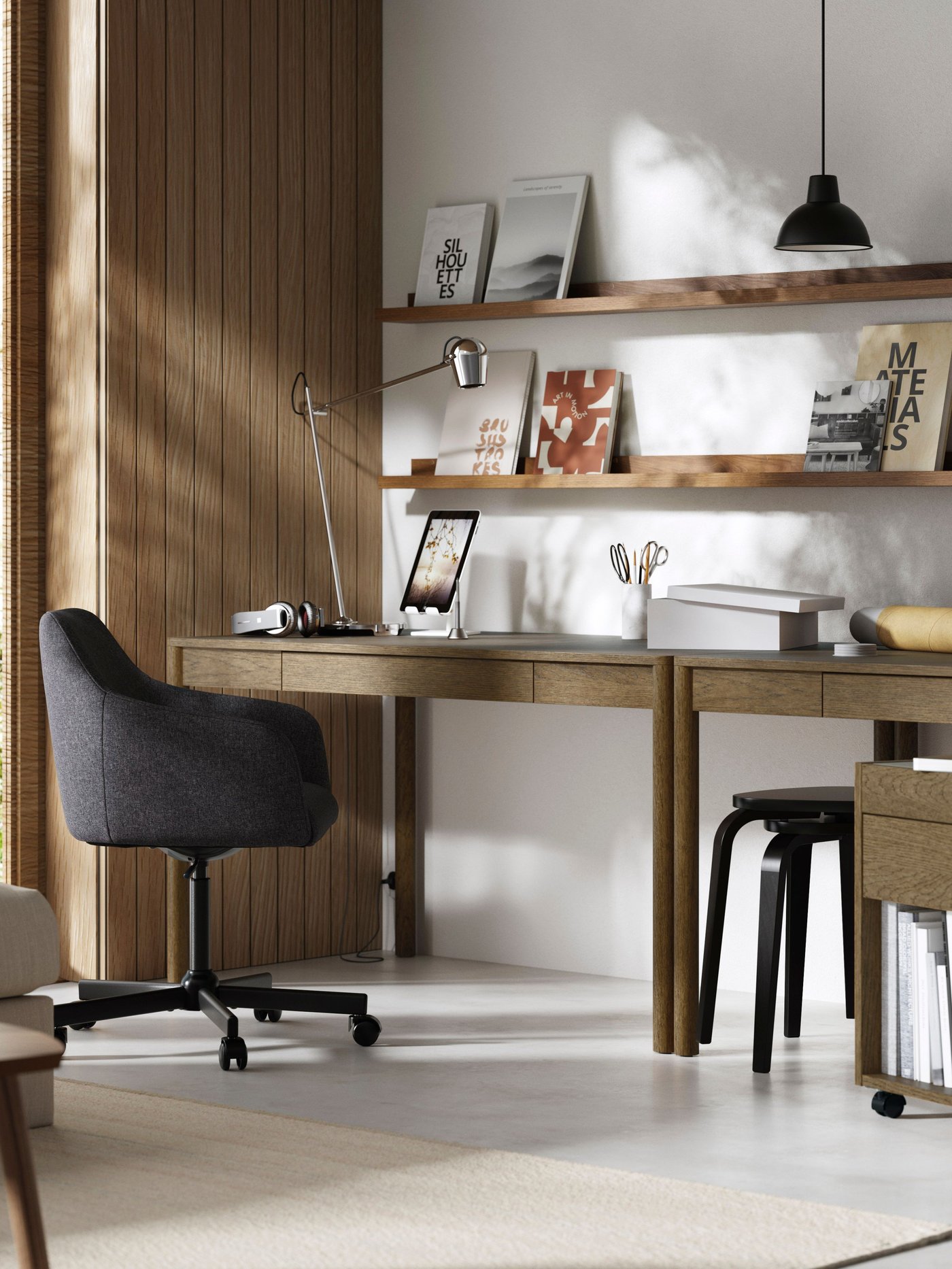 A brown stained oak veneer TONSTAD desk