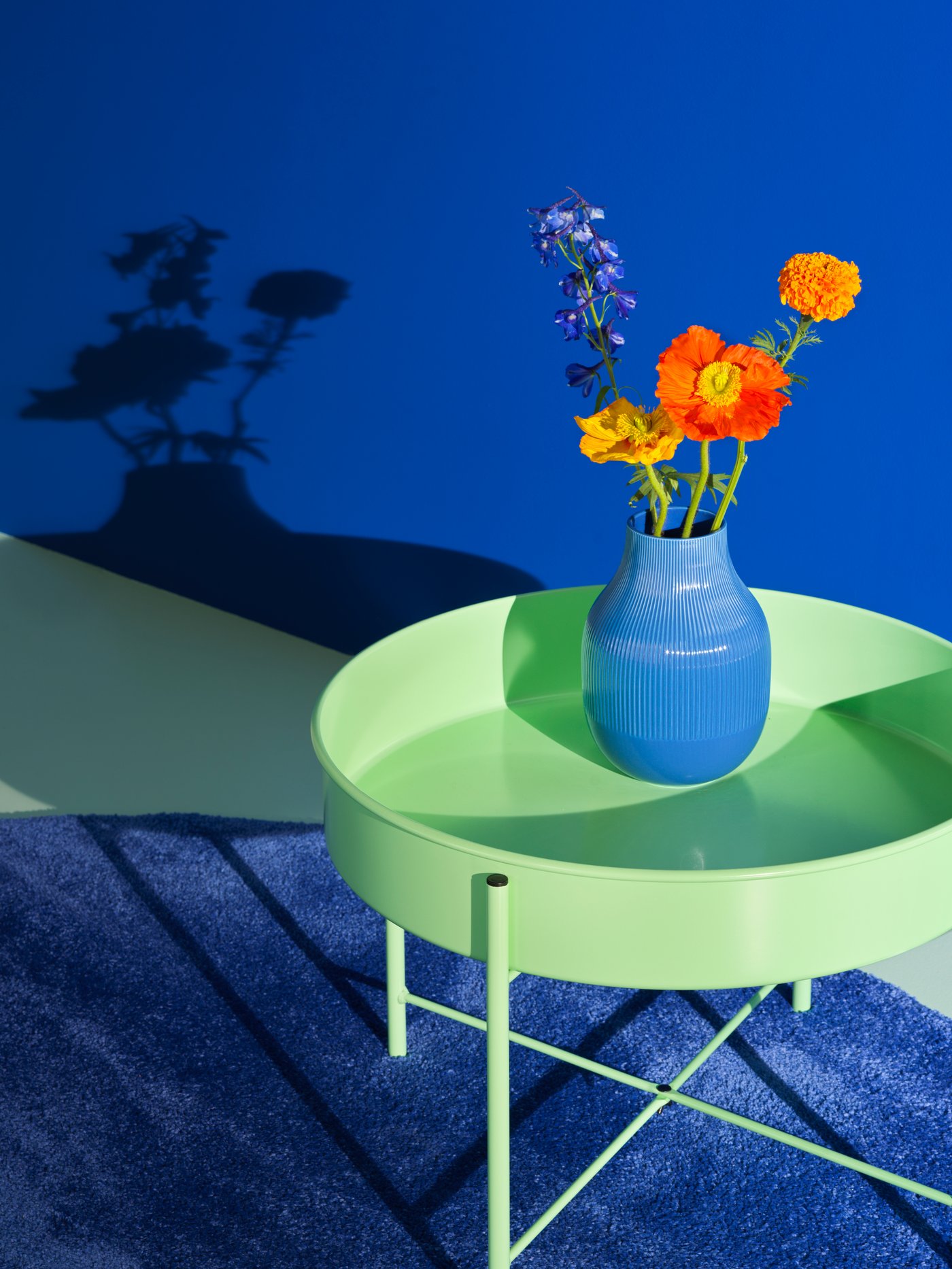 A light green KULTURSKOG plant stand