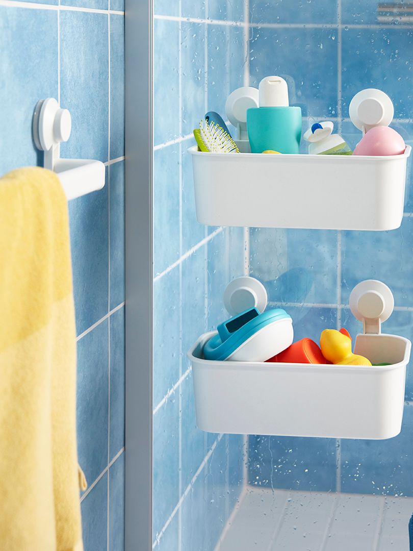 A white TISKEN basket with suction cup