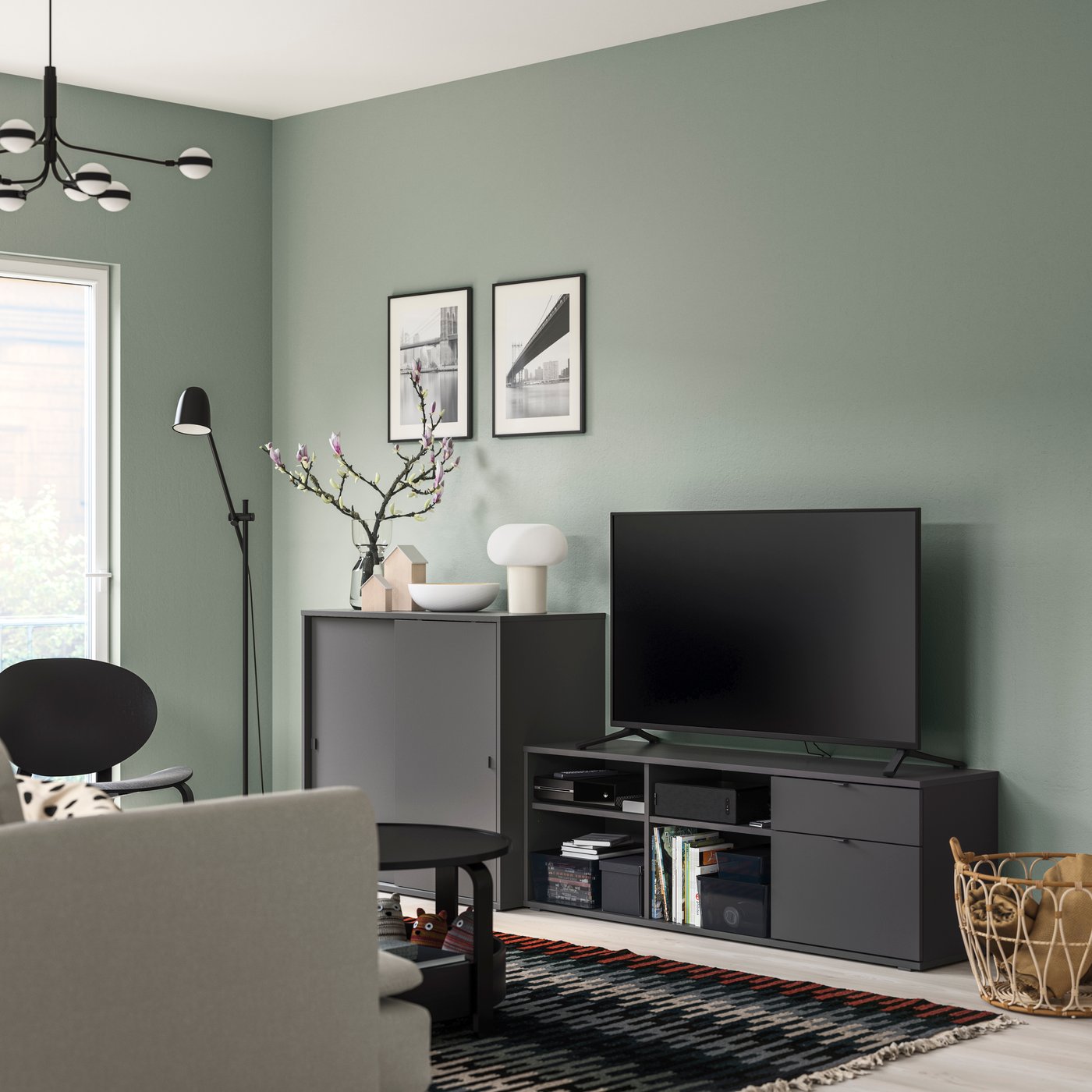 A dark grey VIHALS TV/storage combination