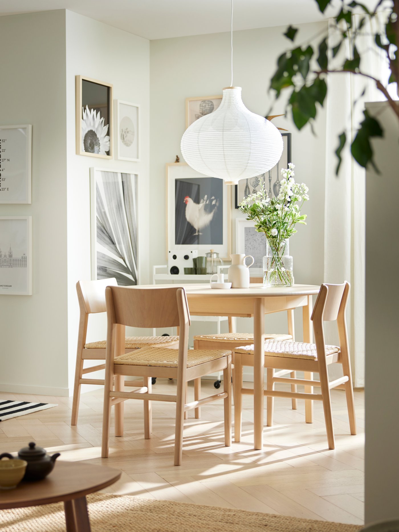 A light beech/veneer SKANSNÄS extendable table