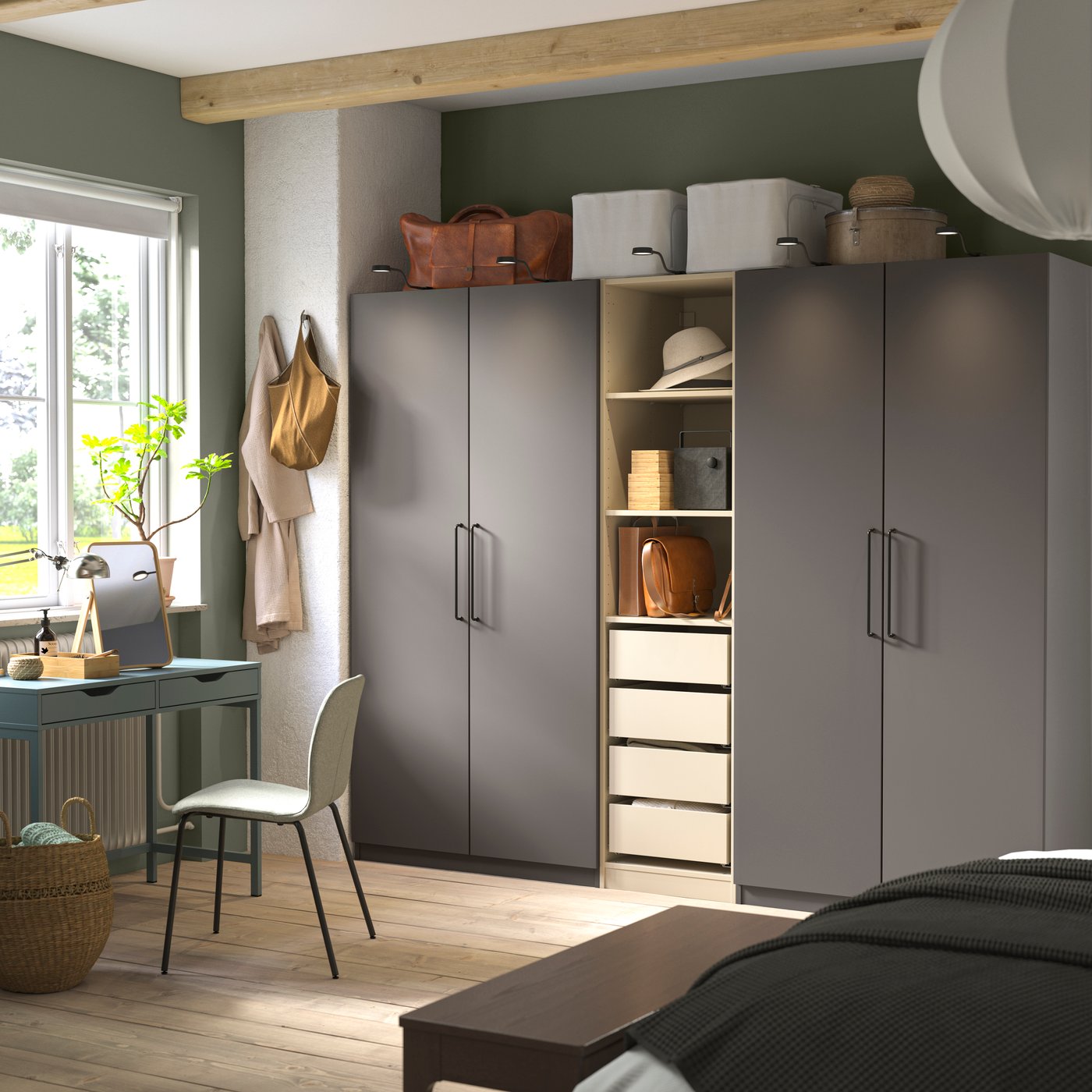 A dark grey grey-beige/dark grey PAX wardrobe combination