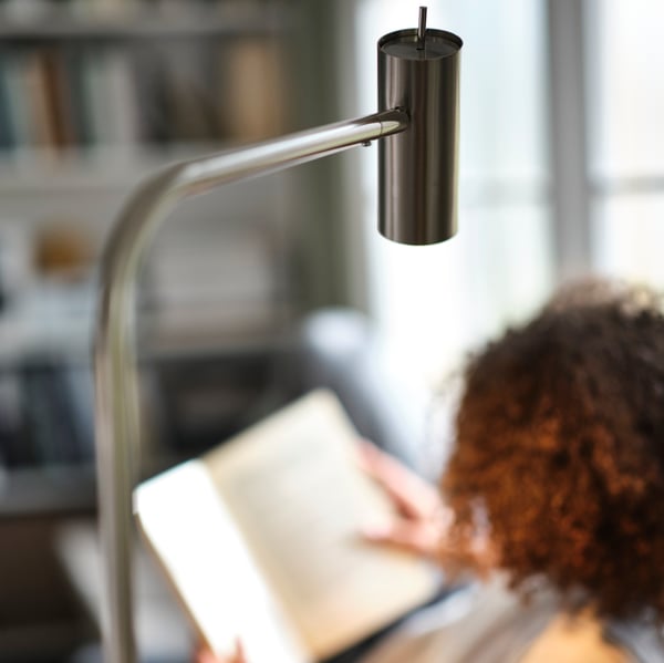 A nickel-plated VIRRMO work lamp in the living room