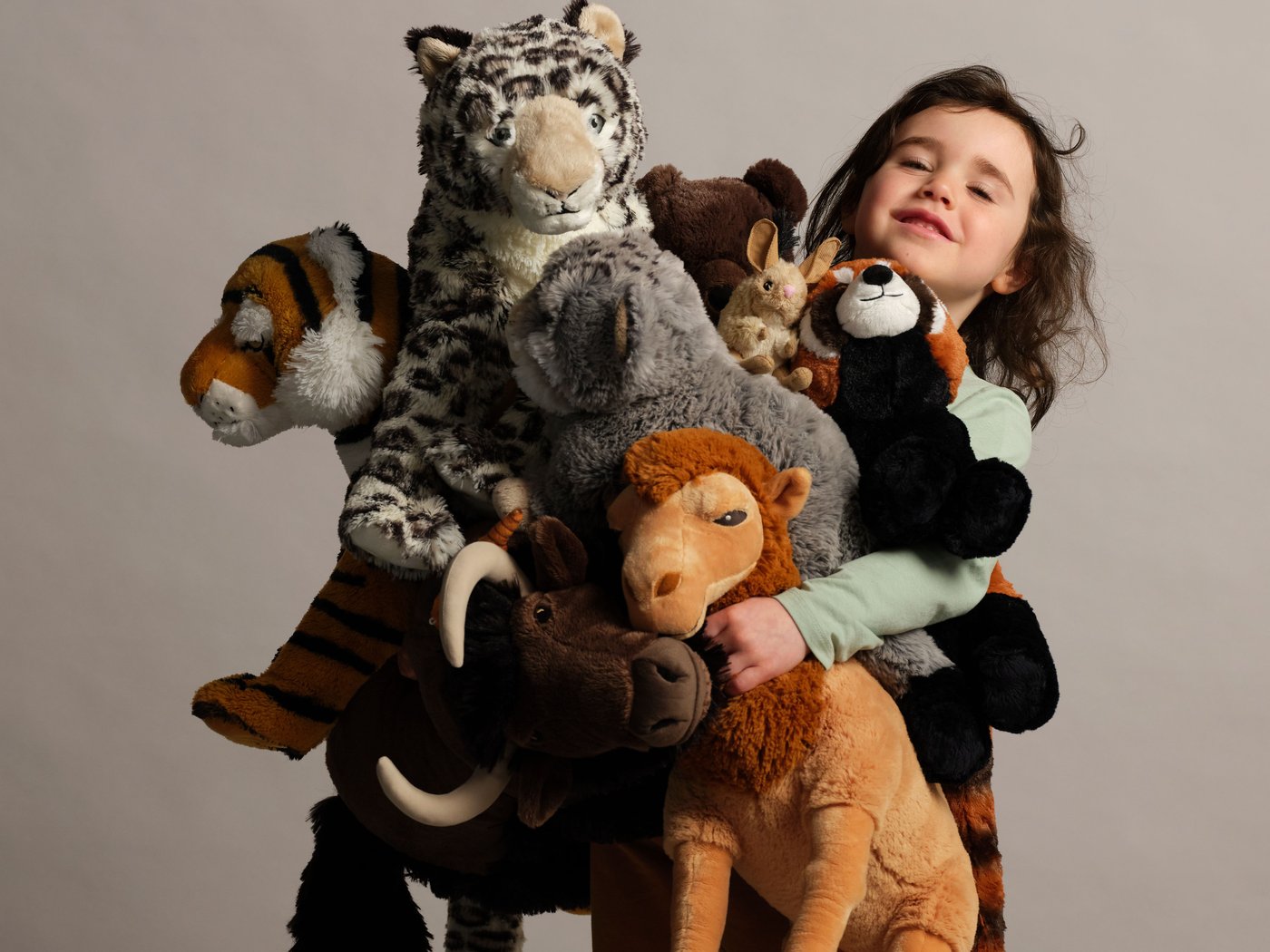 A Bengal tiger/striped light orange ALPTALL soft toy.
