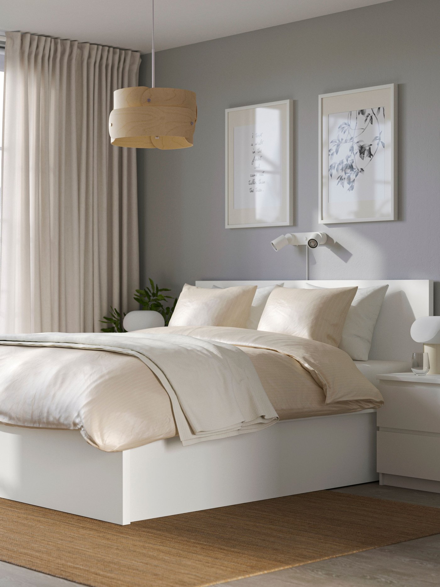 A white MALM ottoman bed