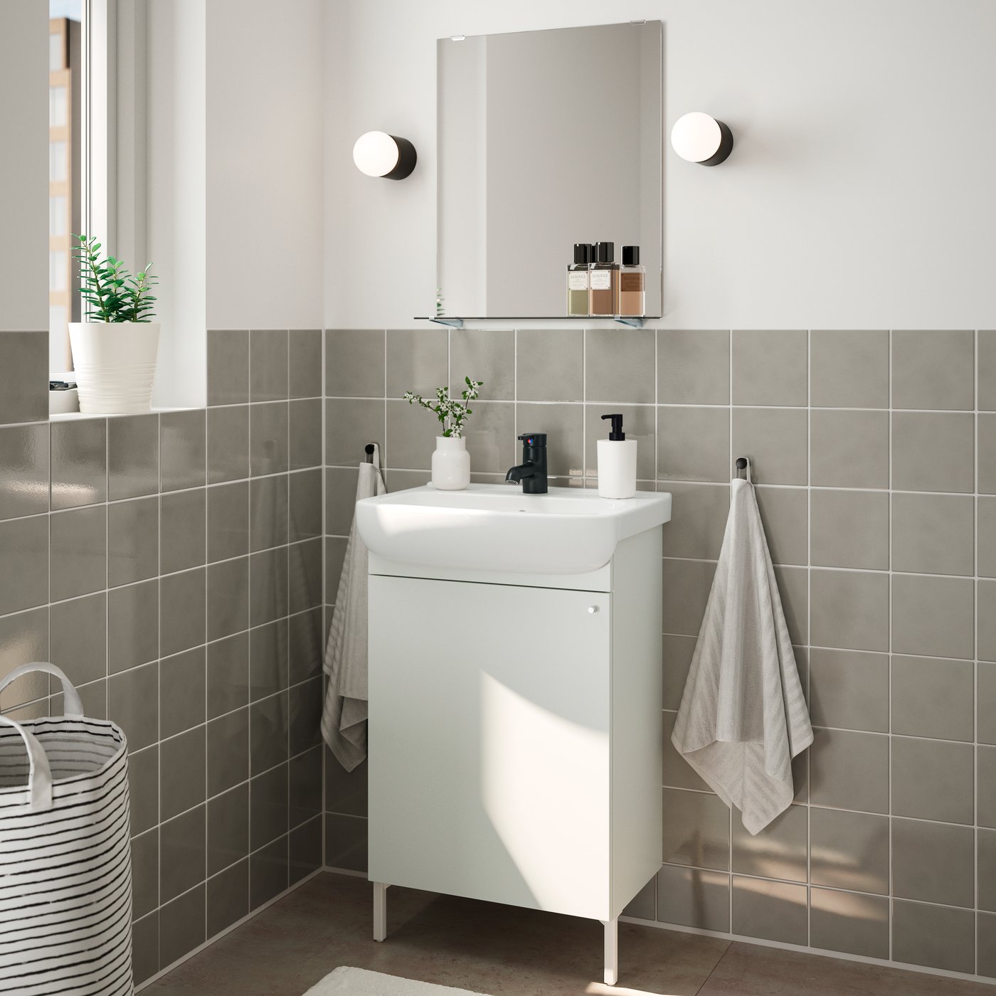 A white STORAVAN 3-piece bathroom set