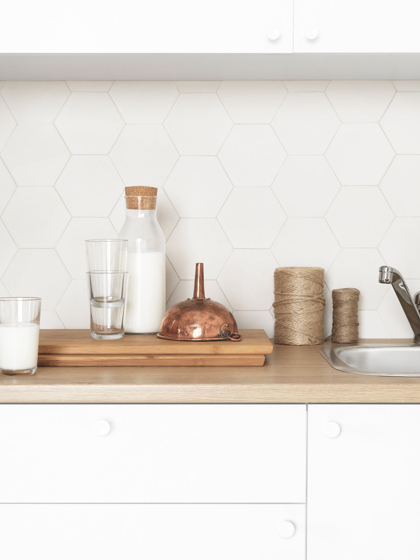 A white KNOXHULT base cabinet with doors and drawer.